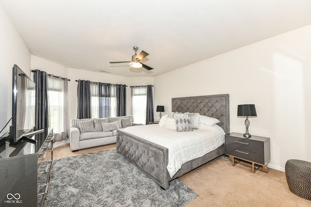 15097 Thoroughbred Dr, Fishers, IN 46040 - carpeted bedroom with baseboards and a ceiling fan