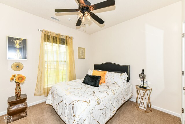 15097 Thoroughbred Dr, Fishers, IN 46040 - carpeted bedroom with baseboards and a ceiling fan