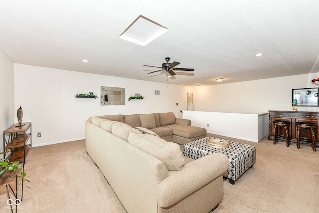 15097 Thoroughbred Dr, Fishers, IN 46040 - living room featuring light carpet, recessed lighting, a ceiling fan, and a bar