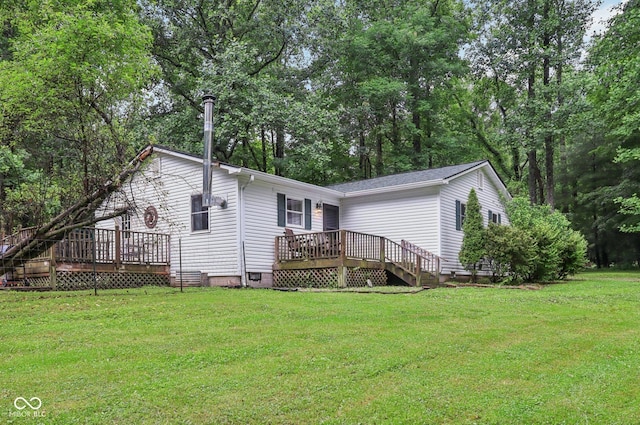 2640 S Silcox Rd, Paragon, IN 46166 - view of front of house with a wooden deck, a front yard, crawl space, and view of scattered trees