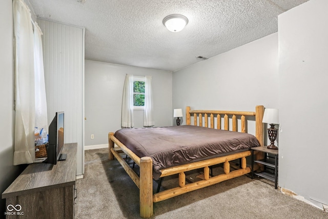 2640 S Silcox Rd, Paragon, IN 46166 - carpeted bedroom featuring a textured ceiling