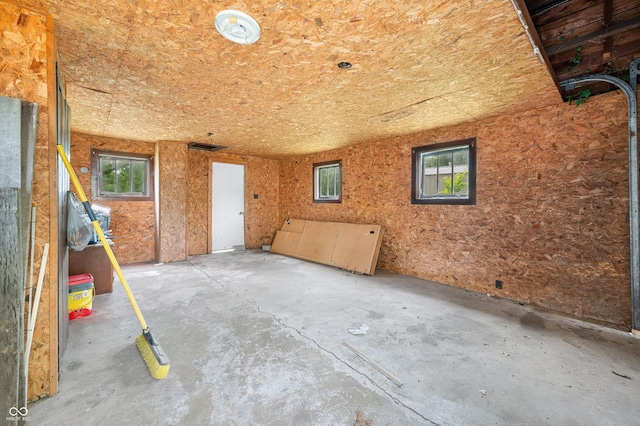 801 N Park St, Seymour, IN 47274 - misc room featuring healthy amount of natural light and unfinished concrete floors