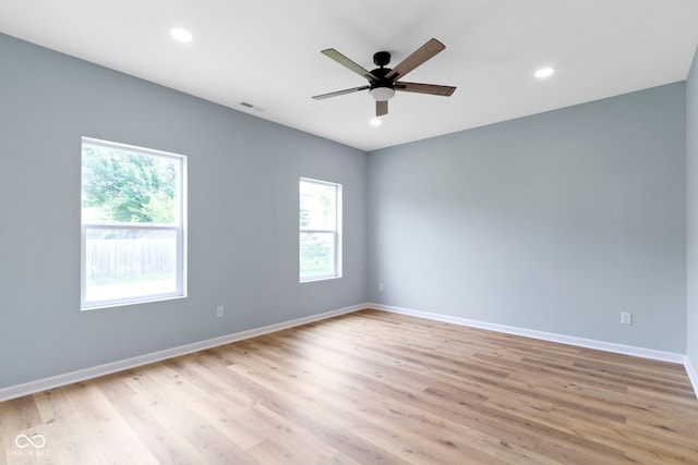 8355 Fieldfare Way, Indianapolis, IN 46237 - empty room with ceiling fan, light wood-style floors, baseboards, and recessed lighting