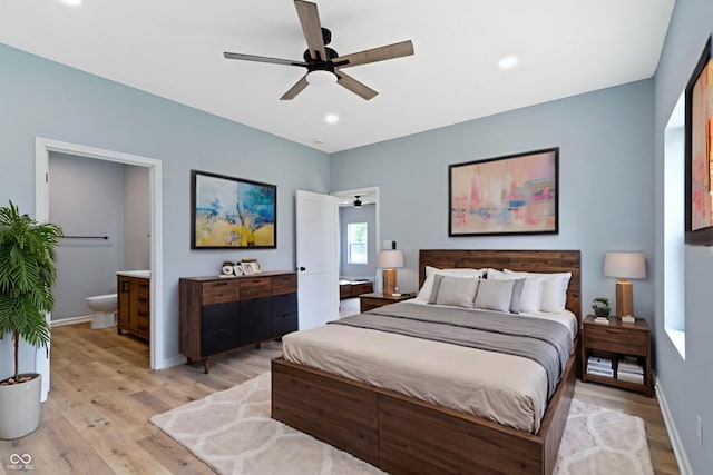 8355 Fieldfare Way, Indianapolis, IN 46237 - bedroom featuring light wood finished floors, baseboards, ensuite bathroom, recessed lighting, and a ceiling fan
