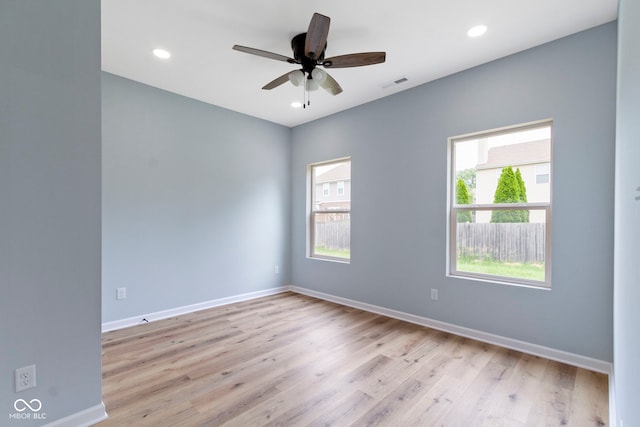 8355 Fieldfare Way, Indianapolis, IN 46237 - spare room with light wood finished floors, baseboards, a ceiling fan, and recessed lighting