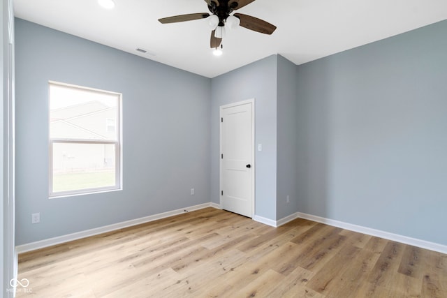 8355 Fieldfare Way, Indianapolis, IN 46237 - spare room with light wood finished floors, baseboards, ceiling fan, and recessed lighting