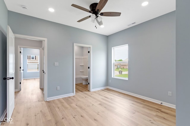 8355 Fieldfare Way, Indianapolis, IN 46237 - unfurnished bedroom with light wood finished floors, baseboards, recessed lighting, connected bathroom, and a ceiling fan