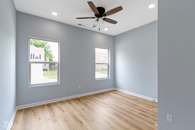 8355 Fieldfare Way, Indianapolis, IN 46237 - empty room with light wood-type flooring, a ceiling fan, recessed lighting, and baseboards