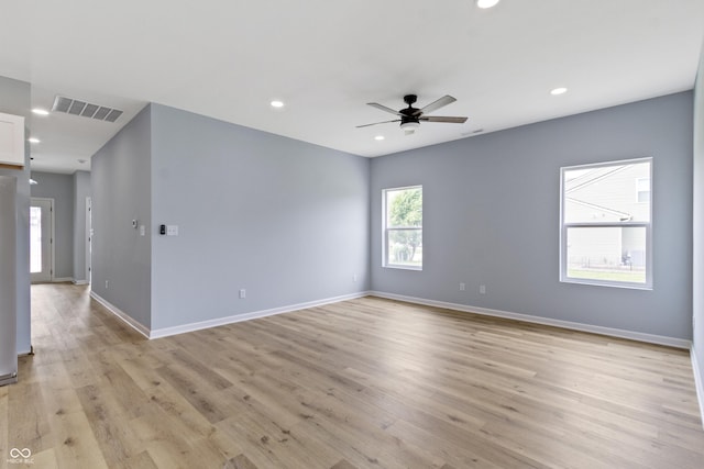 8355 Fieldfare Way, Indianapolis, IN 46237 - spare room with ceiling fan, light wood finished floors, baseboards, and recessed lighting