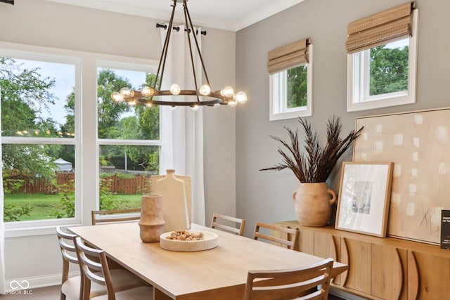 12594 Pasco St, Fishers, IN 46038 - dining room featuring a chandelier, ornamental molding, and baseboards
