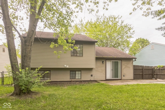 11114 Wismar Dr, Indianapolis, IN 46235 - rear view of house featuring a patio area and a shingled roof