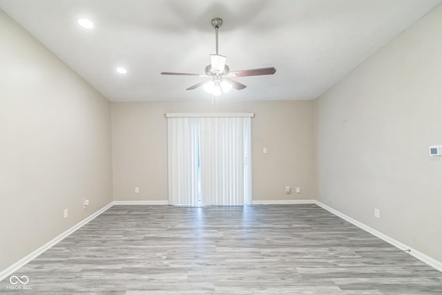 11114 Wismar Dr, Indianapolis, IN 46235 - spare room featuring ceiling fan, wood finished floors, baseboards, and recessed lighting