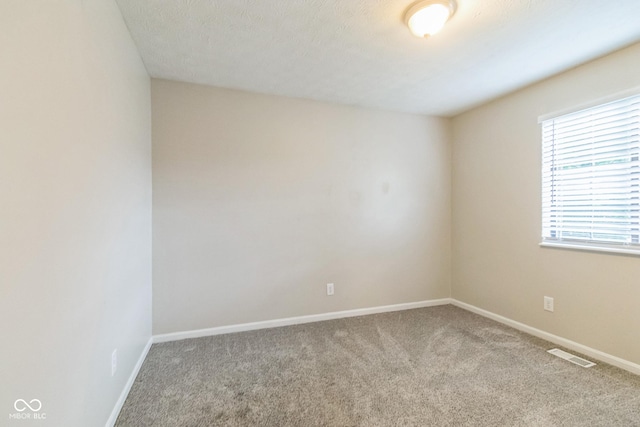 11114 Wismar Dr, Indianapolis, IN 46235 - carpeted spare room with baseboards
