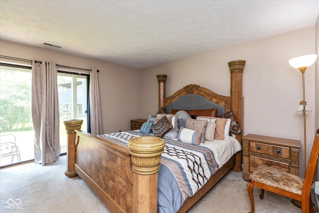 4965 Hawthorne Way, Avon, IN 46123 - bedroom featuring light carpet, access to outside, and a textured ceiling