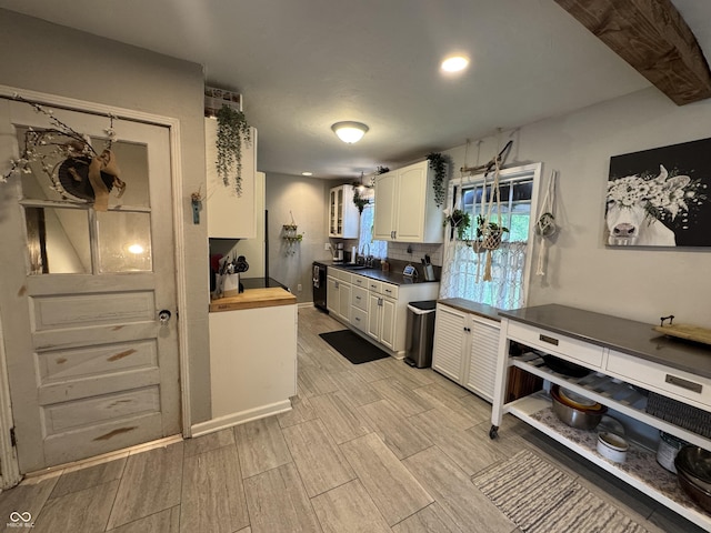 537 N 17th St, Noblesville, IN 46060 - kitchen featuring wood finish floors, white cabinets, tasteful backsplash, and recessed lighting