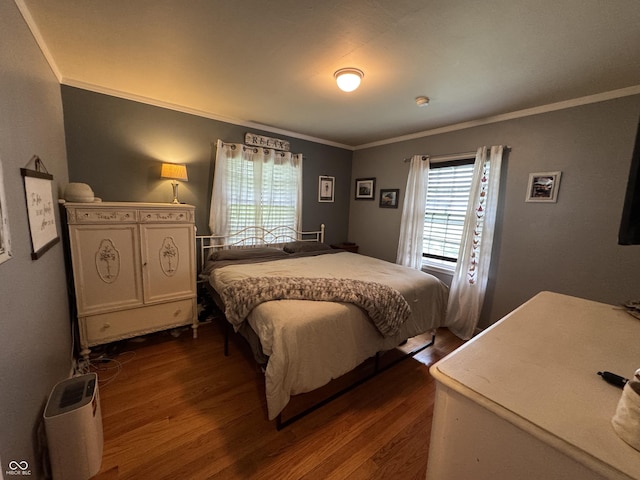 537 N 17th St, Noblesville, IN 46060 - bedroom featuring dark wood-type flooring and ornamental molding