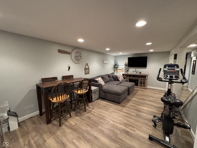 537 N 17th St, Noblesville, IN 46060 - living room with a dry bar, light wood-style flooring, and recessed lighting