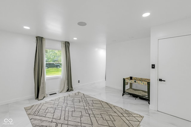 3141 Citadel Ct, Indianapolis, IN 46268 - unfurnished bedroom with marble finish floors and recessed lighting