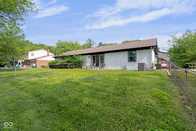 3141 Citadel Ct, Indianapolis, IN 46268 - back of property with brick siding and a fenced backyard