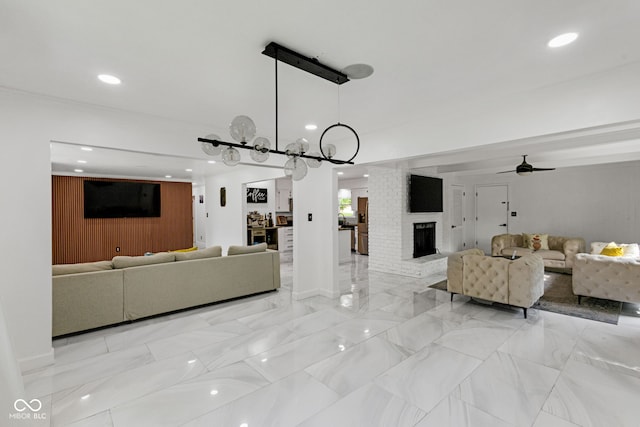 3141 Citadel Ct, Indianapolis, IN 46268 - living room featuring a ceiling fan, recessed lighting, and a fireplace