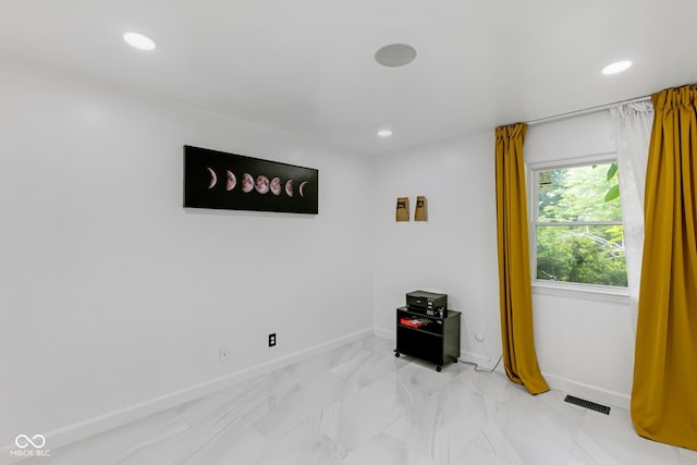 3141 Citadel Ct, Indianapolis, IN 46268 - spare room with recessed lighting and light marble finish floors