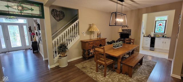 4232 Parliament Way, Avon, IN 46123 - dining room with dark wood-style floors, stairway, and baseboards