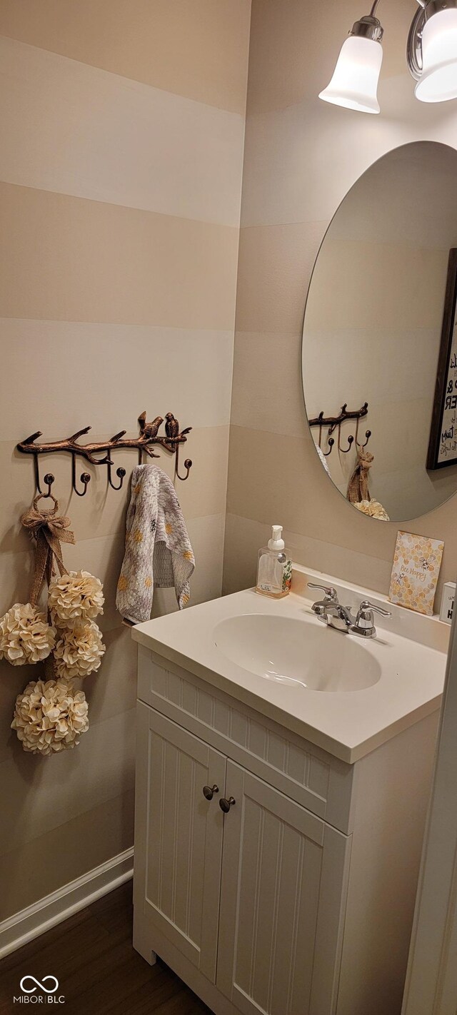 4232 Parliament Way, Avon, IN 46123 - bathroom with vanity and wood finished floors