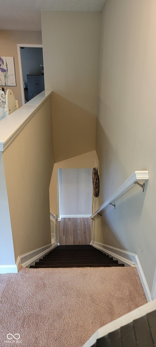4232 Parliament Way, Avon, IN 46123 - stairs featuring baseboards