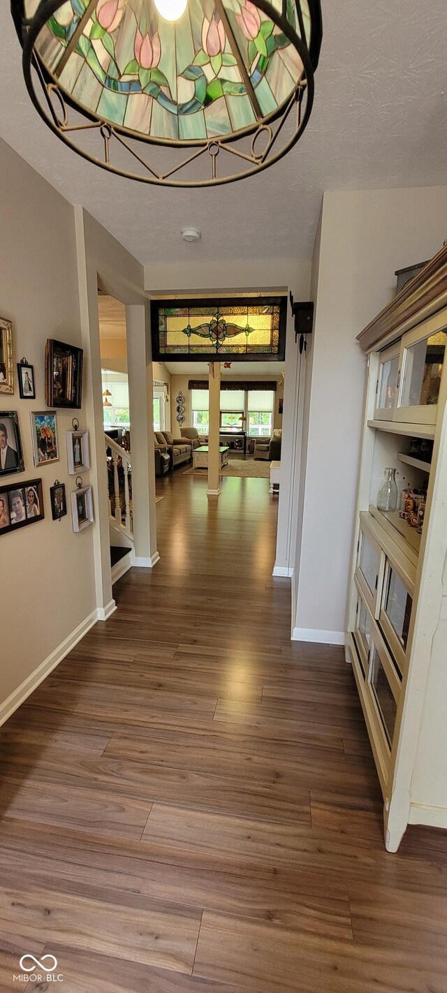 4232 Parliament Way, Avon, IN 46123 - hall featuring wood finished floors and baseboards