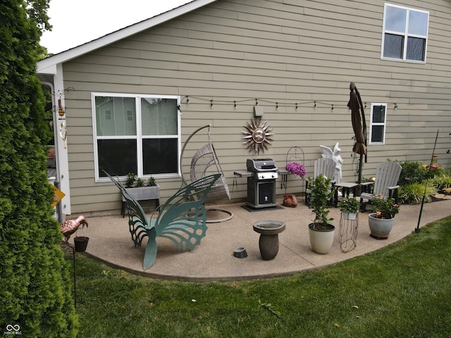 4232 Parliament Way, Avon, IN 46123 - rear view of property featuring a patio area and a lawn