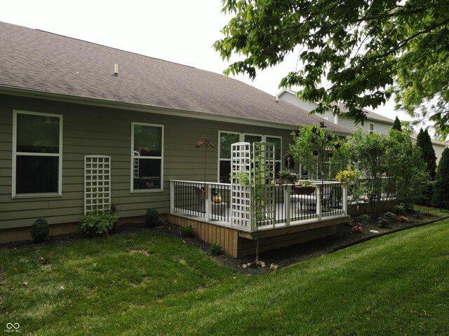 4232 Parliament Way, Avon, IN 46123 - back of property featuring a deck, a lawn, and a shingled roof