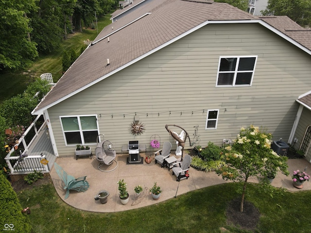 4232 Parliament Way, Avon, IN 46123 - rear view of house featuring a patio, a shingled roof, and cooling unit