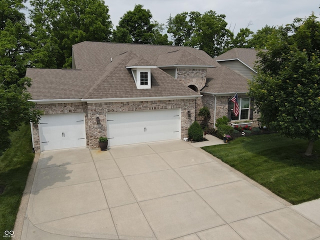 4232 Parliament Way, Avon, IN 46123 - view of front of property with driveway, a garage, a shingled roof, and a front lawn