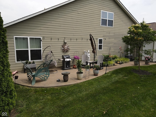 4232 Parliament Way, Avon, IN 46123 - back of house with a patio, a lawn, and central air condition unit