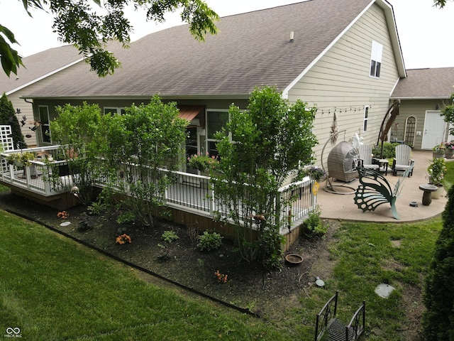 4232 Parliament Way, Avon, IN 46123 - back of house with a shingled roof, a patio area, and a wooden deck
