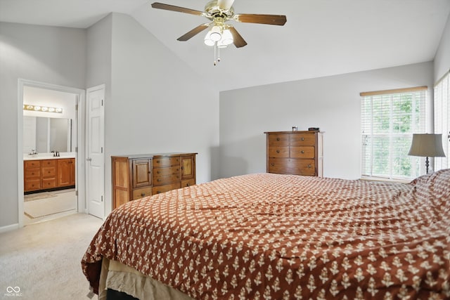 10410 Trillium Ct, Noblesville, IN 46060 - bedroom featuring light carpet, ensuite bathroom, ceiling fan, a sink, and high vaulted ceiling