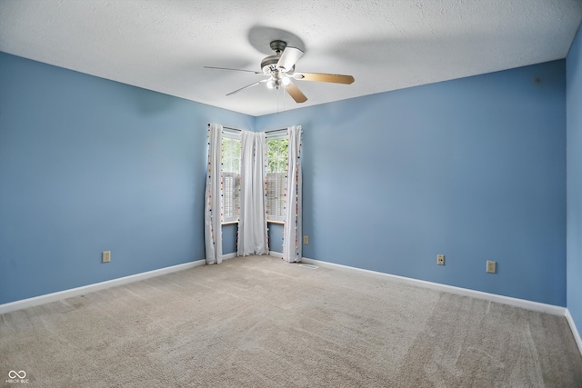 10410 Trillium Ct, Noblesville, IN 46060 - carpeted empty room featuring a ceiling fan, baseboards, and a textured ceiling