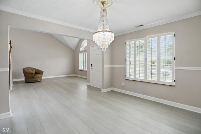 10410 Trillium Ct, Noblesville, IN 46060 - unfurnished dining area featuring plenty of natural light, a chandelier, wood finished floors, crown molding, and baseboards