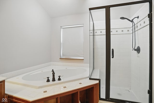 10410 Trillium Ct, Noblesville, IN 46060 - full bath featuring a stall shower, a garden tub, and a textured ceiling