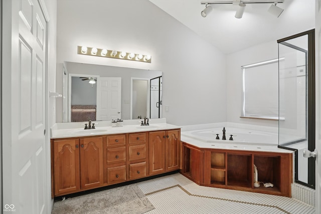 10410 Trillium Ct, Noblesville, IN 46060 - full bath featuring vaulted ceiling, a bath, double vanity, and a ceiling fan