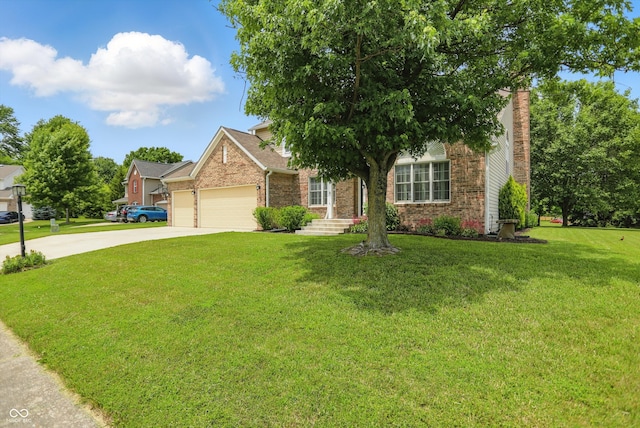 10410 Trillium Ct, Noblesville, IN 46060 - view of property hidden behind natural elements featuring brick siding, concrete driveway, an attached garage, and a front yard