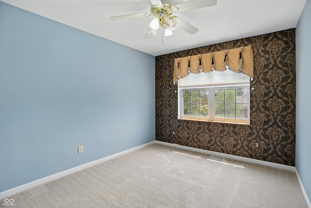 10410 Trillium Ct, Noblesville, IN 46060 - unfurnished room with carpet floors, baseboards, wallpapered walls, and ceiling fan