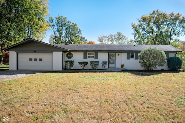 1325 Alimingo Dr, Indianapolis, IN 46260 - ranch-style home with gravel driveway, an attached garage, a front yard, and brick siding