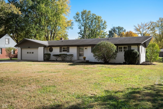 1325 Alimingo Dr, Indianapolis, IN 46260 - ranch-style home featuring a garage, driveway, and a front lawn