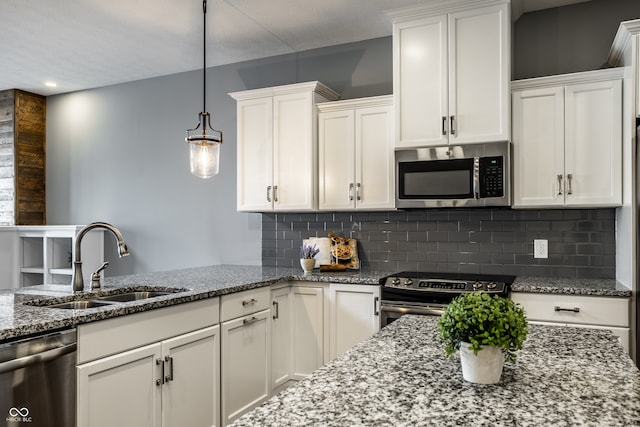 478 Firefly Ln, Carmel, IN 46032 - kitchen featuring appliances with stainless steel finishes, a sink, and white cabinets