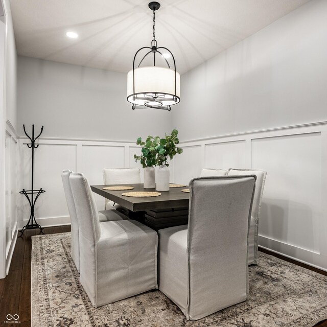 478 Firefly Ln, Carmel, IN 46032 - dining space with a decorative wall, wood finished floors, wainscoting, and recessed lighting