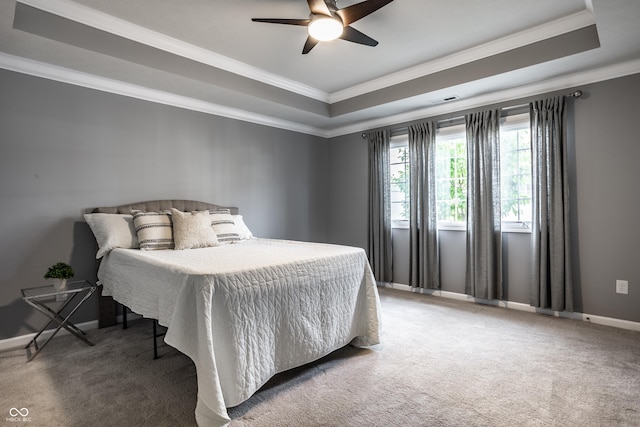478 Firefly Ln, Carmel, IN 46032 - carpeted bedroom featuring a tray ceiling, crown molding, baseboards, and ceiling fan