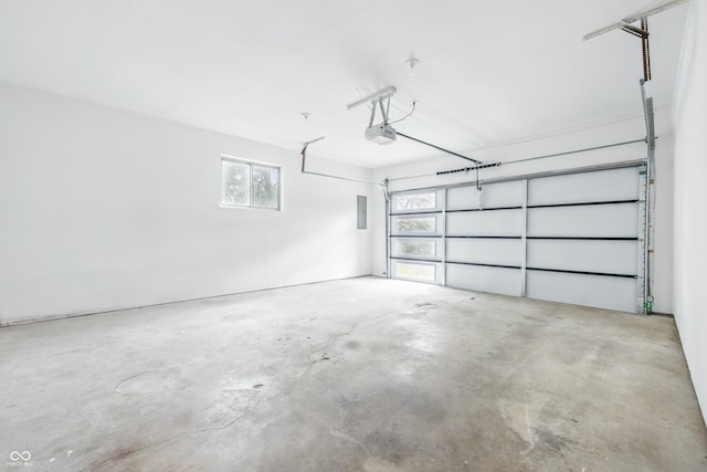 6704 Hoover Rd, Indianapolis, IN 46260 - garage with a garage door opener and electric panel