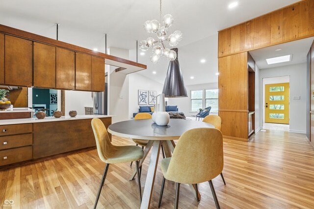6704 Hoover Rd, Indianapolis, IN 46260 - dining space featuring light wood finished floors, a chandelier, recessed lighting, and baseboards