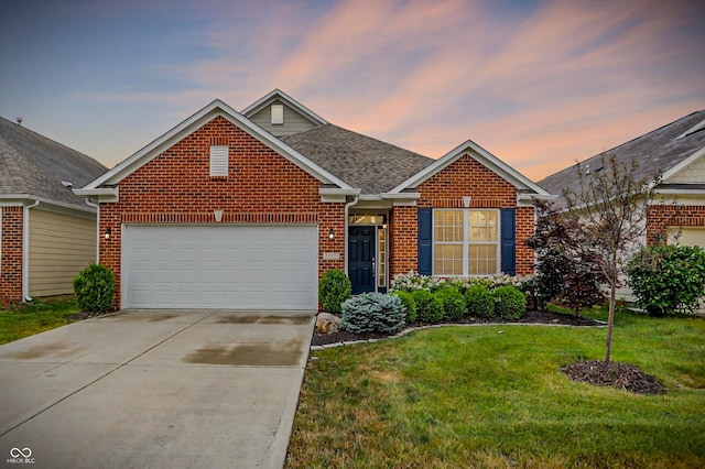 13528 Cuppertino Ln, Carmel, IN 46074 - view of front of home with brick siding, driveway, a yard, a garage, and a shingled roof